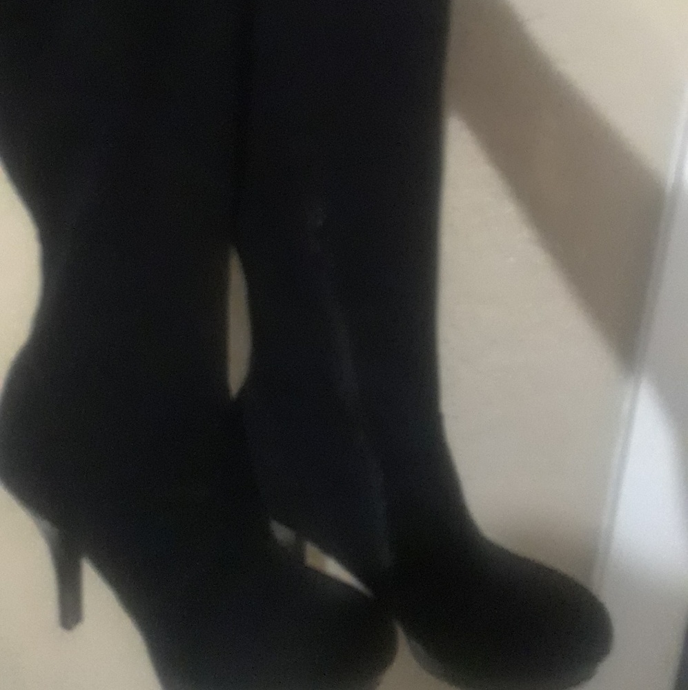 Tall black boots